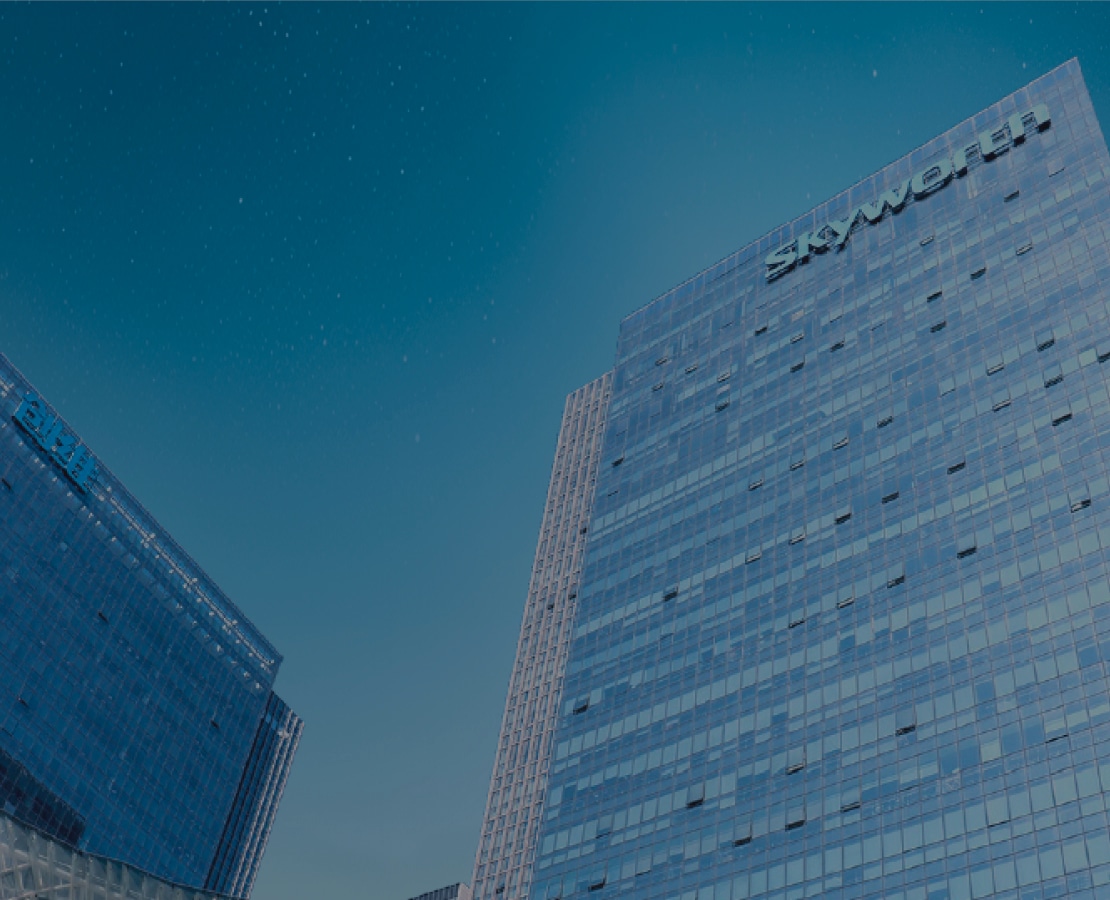 Skyworth headquarters high-rise building under blue sky, representing Solavita corporate strength and global brand image
