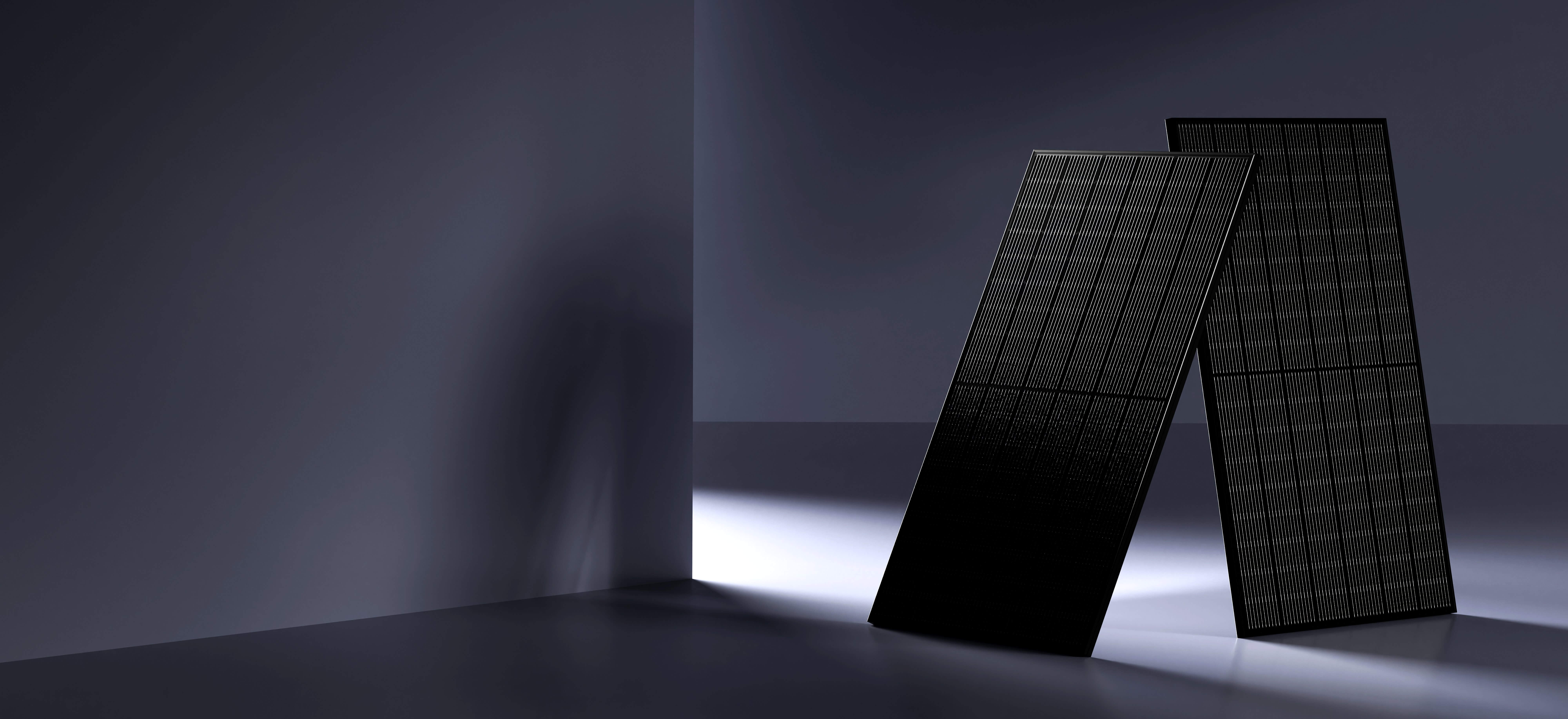 Solavita all-black solar panels displayed in a minimalistic dark environment with dramatic lighting