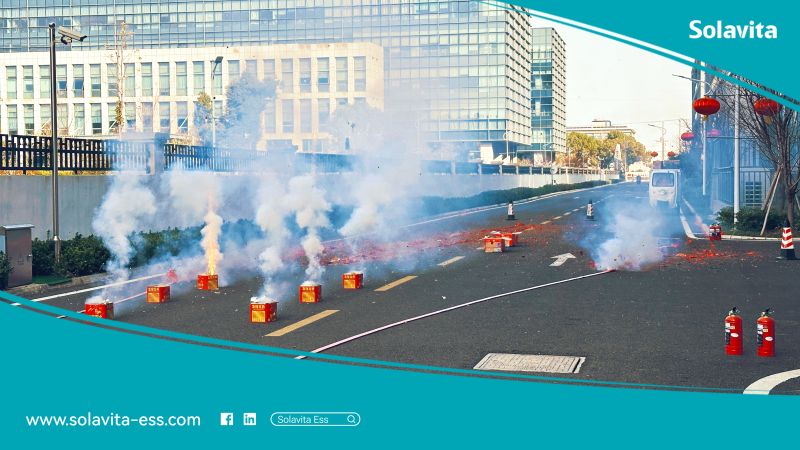Celebration with firecrackers outside Solavita headquarters, marking a festive start or grand opening event in China